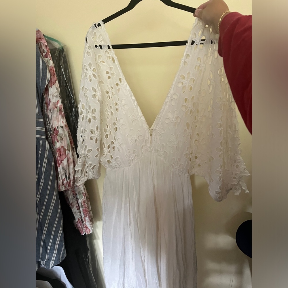 White eyelet dress can be worn on or off the shoulders